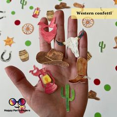 a person's hand with various items on it and the words western confetti