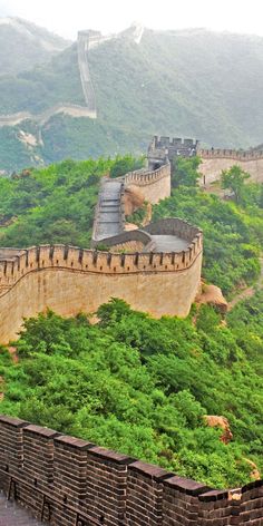 the great wall of china is surrounded by greenery