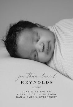 a black and white photo of a baby sleeping on top of a bed with the words,