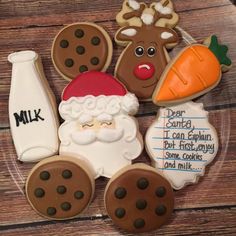 decorated cookies in the shape of santa claus