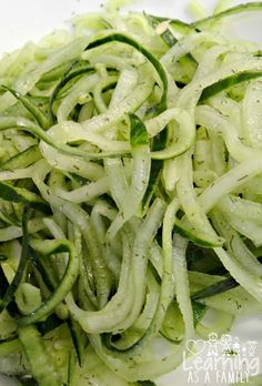 sliced cucumbers on a white plate ready to be eaten