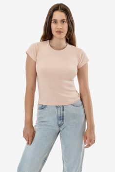 This versatile t-shirt is made of our 1x1 combed cotton baby rib and has been garment dyed to match our bestselling styles. This top has a feminine cut with cap sleeves and a crew neckline finished with tasteful binding. Semi-fitted with a flattering mid-length cut. This 100% cotton has been garment dyed and is shrink-free! Made in the USA with US-grown cotton by workers earning fair wages. This item is a garment dye product. Garment dye items can be distinguished by “GD” at the end of their sty Denim Short Jumpsuit, Jumpsuit Jacket, Cotton Baby, Cotton Style, Festival Wear, Combed Cotton, High Waist Jeans, Cap Sleeves, Shirt Style