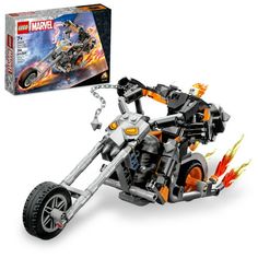 a lego motorcycle with flames coming out of it's back end and the box is open