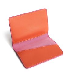 Keep your passport safe and stylish with our Passport Cover. Crafted from high-quality materials, this sleek and durable cover is designed to protect your passport from wear and tear while adding a touch of sophistication to your travel accessories. With its slim design it's the perfect companion for jet-setting adventures or everyday use. Vera Bradley Passport Cover in Orange Trendy Bifold Travel Card Holder, Trendy Leather Travel Card Holder, Pink Wallets With Interior Card Slots For Travel, Modern Pink Card Holder, Travel Pink Wallets With Rfid Blocking, Pink Bifold Card Holder With Rfid Blocking, Pink Rfid Blocking Bifold Card Holder, Pink Rfid Blocking Wallets For Travel, Pink Rfid Blocking Travel Wallets