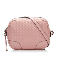 This Pre-Owned Gucci GG Leather Bree Crossbody Bag is perfect for those who want to add a touch of luxury to their outfit. The bag features a beautiful brown GG leather fabrication, which gives it a classic and timeless look. Bag Silhouette: Crossbody Bags Color: Pink Fabrication: GG Leather Closure Type: Zip The adjustable flat leather shoulder strap ensures that the bag can be worn comfortably over the shoulder or across the body. The top zip closure provides secure storage for your belongings Burberry Sunglasses, Contemporary Eclectic, Alessandro Michele, Carry All Bag, Luxury Goods, Fashion House, Small Leather Goods, Pink Leather, Italian Fashion