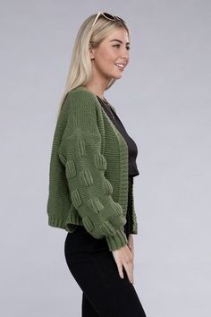 Green open front drop shoulder cardigan with long sleeves. Adding great texture to your fall outfit, this chunky cardigan is a Made from a quality knit-blend of materials, this stylish cardigan is a stylish conversation piece. Mold is 5.7, wearing size S. Oversized fit intended. Recommended sizing 2-4 S, 6-8 M, 8-10 L Winter Open Knit Shrug For Layering, Open Front Textured Knit Cardigan, Textured Knit Open Front Cardigan, Trendy Solid Chunky Knit Cardigan, Open Front Chunky Knit Sweater, Trendy Textured Knit Solid Cardigan, Casual Open Knit Shrug For Winter, Trendy Solid Textured Knit Cardigan, Chic Solid Cardigan With Textured Knit