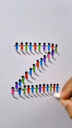 a hand holding a marker drawing a group of people in the shape of a arrow