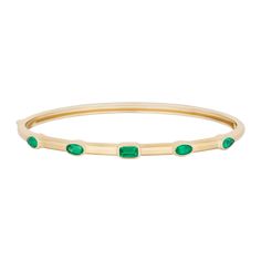 Our Multi Bangle is a true staple for any jewelry collection. It's chic and modern with it's play on the various shaped gemstones. It also adds the perfect pop of color to your wristgame. Be warned, they're addictive! 14k yellow gold and diamonds, pink sapphires, emerald, or black spinel Gemstone weight approximately 1.30ct Length 7 inch (oval shaped) Bangle width 3.25mm Hidden closure with side push clasp Please allow 4-6 weeks for production if not in stockCustom lengths available upon request