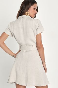 You'll make everyone's day when they see you out in the Lulus Delightful Dear Beige Linen Short Sleeve Button-Front Mini Dress! Lightweight woven linen-blend fabric shapes this charming dress that has a collared neckline, darted bodice, and short sleeves. A functional button placket continues through the high, fitted waist that boasts a tying sash belt before falling to a cute mini hem. Fit: This garment fits true to size. Length: Mid-thigh. Size medium measures 34.5" from shoulder to hem. Bust: Fitted Shirt Dress With Pockets For Vacation, Chic Short Sleeve Linen Mini Dress, Chic Linen Mini Dress With Short Sleeves, Spring Beige Button-up Mini Dress, Beige Button-up Mini Dress For Spring, Fitted Beige Mini Dress With Pockets, Beige Linen Shirt Dress For Day Out, Beige Mini Length Shirt Dress For Work, Neutral Mini Dress For Work