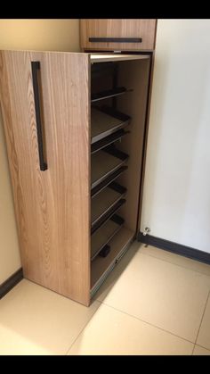 a wooden cabinet with many drawers in it