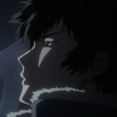 an anime character with black hair and white fur on his head looking at something in the distance