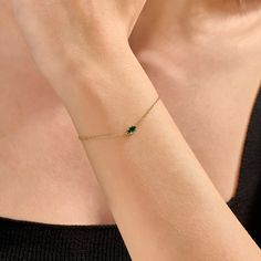 Embrace elegance with the Emerald Solitaire Bracelet, featuring a small oval cut genuine gemstone. Crafted in 14k Solid Gold, this cable chain bracelet is a stunning single stone piece perfect for women. 𝐈𝐭𝐞𝐦 𝐃𝐞𝐭𝐚𝐢𝐥𝐬 * Gold KT: 14KT  * Custom Gold Color: Yellow Gold  * Chain Width 3.75mm x 7.05 mm 𝐆𝐞𝐦𝐬𝐭𝐨𝐧𝐞 𝐃𝐞𝐭𝐚𝐢𝐥𝐬 * Main Gemstone: Emerald * Total Ctw: 0.20 Ctw ▶ Want to find out more 𝐛𝐫𝐚𝐜𝐞𝐥𝐞𝐭𝐬? https://etsy.me/3wt3nc6 ▶ Want to find out more? See our storefront 14k Gold Oval Diamond Bracelet Gift, Formal Oval Bracelets With Birthstone, Dainty Oval Bracelets For Formal Occasions, Green Oval Diamond Bracelet For Gift, Green Oval Diamond Bracelet Gift, Emerald Yellow Gold Bracelet For Gift, Gold Emerald Bracelet Gift, Adjustable Dainty Green Chain Bracelet, Classic Gold Bracelets With Emerald