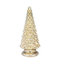 a small gold christmas tree on a white background