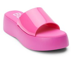 Retro-inspired style that pairs perfectly with any warm-weather look, the Solar slide sandal offers a classic wide band and a padded insole to keep feet happy all day. From Beach by Matisse. Pink Sandals For Poolside Spring, Pink Sandals For Spring Poolside, Trendy Pink Poolside Sandals, Pink Spring Poolside Sandals, Summer Platform Open Toe Slides, Trendy Platform Slides For Vacation, Pink Synthetic Sandals For Poolside, Trendy Spring Slide Flip Flops, Trendy Sandals For Poolside Spring Occasion