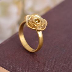 "Rose Ring in Brass, Rose Ring for Women, Flower Ring, Rosebud Ring, Floral Ring, Rose Jewelry, Dainty Ring, Romantic Gift For Her Size:- All Size Available In Variation Metal:- Brass MUST READ....👇 5 stars is my shop's priority. So contact me before leaving any negative review. I am here only for my dear customers. it is poor Etsy manners to Leaving a negative review without conversation with your seller. If you are not satisfied with my jewelry, then please contact me, I will solve your problem. ❥ Customers' satisfaction is our biggest priority, please contact us with any questions/queries for future or existing orders, and we will do our best to make sure you are happy with your order. ❥Please make sure to add the correct address during checkout. You can return your purchased item with Gold Rose Ring, Teen Ring, Simple Rings, Gold Flower Ring, Romantic Gifts For Her, Ring Flower, Romantic Jewellery, Floral Ring, Trendy Ring