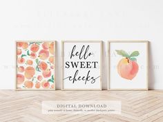 three watercolor peaches are on the wall next to two framed prints that say hello sweet cheeks