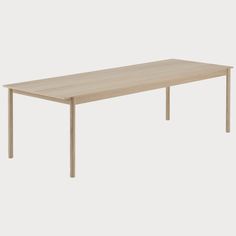 a wooden table on a white background with no one around it or the table top