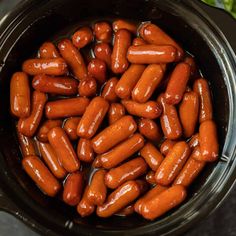 hot dogs are cooked in the slow cooker