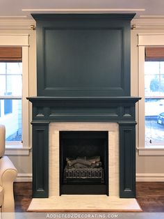 an empty living room with a fireplace in it