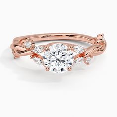 a rose gold engagement ring with an oval diamond center