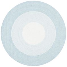 a white and blue plate on a white background with an oval design in the center