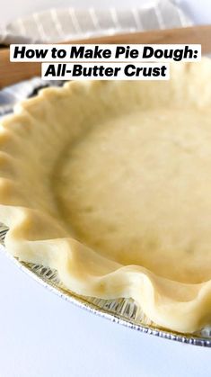 an uncooked pie crust on top of a pan