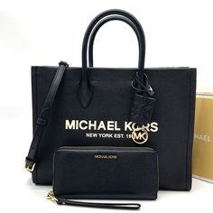 Brand New With Tag Michael Kors Mirella Medium Ew Tote Bag Color: Black Product Details About This Item Fabric Type 100 % Polyester Pebbled Leather Origin Imported About This Item Gold-Tone Hardware 15.75”W X 14”H X 7.75”D Handle Drop: 5.25” Adjustable Strap: 20.5”-24.25” Interior Details: Back Zip Pocket, 2 Front Slip Pockets Lining: 100% Polyester Description Details Tote Bag Logo Pvc Leather Gold-Tone Hardware 15.75”W X 14”H X 7.75”D Handle Drop: 5.25” Adjustable Strap: 20.5”-24.25” Interior Black Leather Wallet For Shopping, Elegant Everyday Wallets With Logo, Elegant Wallets With Logo, Michael Kors Black Wallet For Everyday Use, Chic Black Wallet For Shopping, Black Wallet With Gold-tone Hardware For Everyday Use, Black Wallets With Gold-tone Hardware For Daily Use, Black Wallets With Gold-tone Hardware, Camden Bag