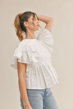 Ruffle sleeve top and asymmetrical ruffle hem detail front peplum t-shirt top.