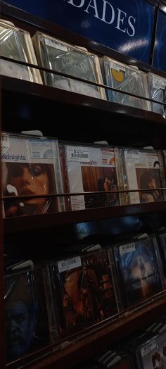 there are many cd's on the shelves in this store that is selling them