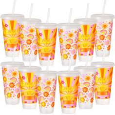 six plastic cups with different designs and straws