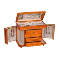 an open wooden jewelry box with three drawers