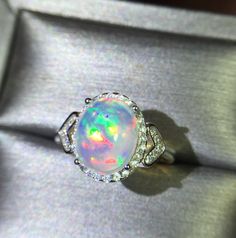 Welcome to Elegant Art Jewelry!  Stone: Natural Opal Stone Size:. 8mm×10mm Side Stone:. Zirconia Metal: 925 Sterling Silver Plating: Platinum Plated, Rose Gold Plated Personalization: 9K/14K/24K/GOLD/SILVER/PLATINUM/ROSE-GOLD/WHITE GOLD. (Contact me)  Opal Ring, Opal Cuff Ring, 925 Sterling Silver Ring, Oval Shape Ring, Opal Ring, Opal Engagement, Open Design Ring, Opal Oval, Opal Natural, White Opal, White Gemstone, Gemstone Ring, Engagement Ring, Wedding Ring, Statement Ring, Opal Ring, Victor Opal Ring With Cubic Zirconia And Halo Setting, Formal Opal Ring With Cubic Zirconia, Silver Opal Ring With Accent Stones, Round Cut, Fine Jewelry Opal Ring With Cubic Zirconia, Round Opal Ring With Cubic Zirconia Accent Stones, Silver Opal Ring With Accent Stones, Silver Opal Ring With Halo Setting, Sterling Silver Opal Ring With Halo Design, Silver Opal Ring Round Cut