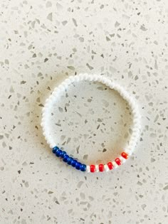 a red, white and blue beaded bracelet