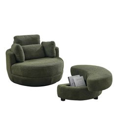 a green chair and ottoman with a book on the end table in front of it