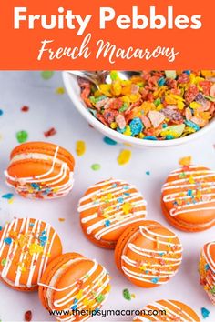 orange frosted cookies with white icing and sprinkles in front of a bowl of fruity pebbles