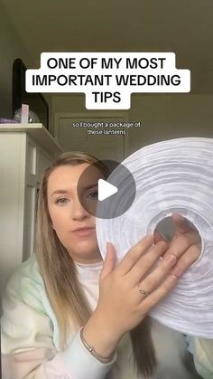 a woman holding a white plate with the words, one of my most important wedding tips