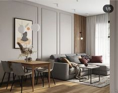 a living room and dining area with wood flooring, white walls and grey couches