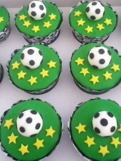 cupcakes with soccer balls and stars on them