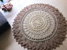 a round rug on the floor in a living room