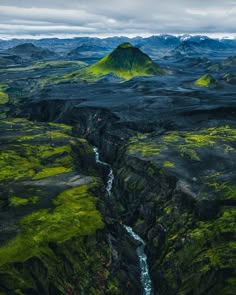 an aerial view of the mountains and rivers