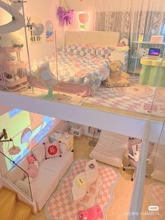 a doll house is shown with furniture and accessories in the living room, including a bed