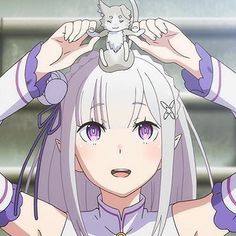 an anime character is holding her head with both hands