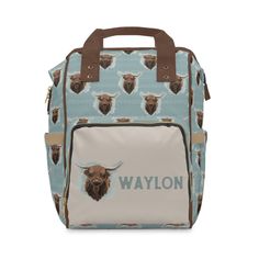 a blue buffalo lunch bag with the word's name on it and an image of bison