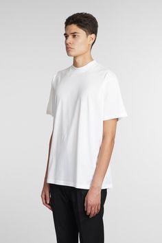 B150 embroidery T-Shirt in white cotton, round neck, short sleeves, straight hem, Made in Moldova, 100% cotton, Model is 183 cm and wears size L Armani Tshirt, Zegna Shoes, Mens Luxury, Engineered Garments, Card Holder Leather, Tory Burch Shoes, Men's Collection, Luxury Retail, Italian Fashion