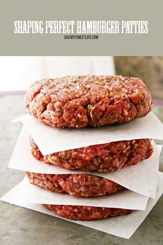 three hamburger patties stacked on top of each other