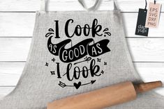 an apron that says i cook as good as i look with a rolling pin next to it