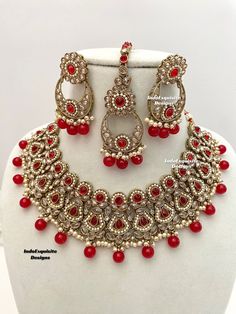 Gorgeous antique gold Polki necklace Set comes with earrings and Tikka/Indian Jewelry/ High quality kundan Polki jewelry/trendy choker/red  All items are shipped from Brampton, Ontario, Canada. If you need your item by a certain day, please reach out to us for express delivery option before placing the order so that we can update the shipping for you. Standard shipping/delivery timeline Below are the estimated delivery times after the order is shipped/dispatched.  ---> USA delivery timeline * 3- Red Kundan Temple Necklace With Stone Work, Red Chandbali Jewelry Sets For Diwali, Festive Red Ruby Kundan Necklace, Red Temple Jewelry Sets For Festive Season, Hand Set Red Kundan Ruby Necklace, Festive Ruby Kundan Necklace For Puja, Red Kundan Temple Necklace For Festivals, Traditional Ruby Kundan Necklace For Puja, Red Ruby Kundan Necklace For Diwali