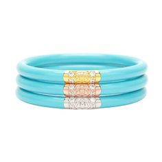 Turquoise All Weather Bangles® (AWB®) are an über-chic addition to any BuDhaGirl stack. These amazing bangles are weightless, soundless, waterproof and TSA proof. Each of the three bangles in the set is meant to represent an intention for your day. As you put them on, affirm your intentions in the morning, and when you remove them in the evening, fill yourself with thoughts of gratitude. This daily ritual will settle your mind at the beginning and end of each day. Ivory All Weather Bangles are made of  polycarbonate rings that are sealed with a Swarovski-crystal-encrusted BuDhaGirl CHOP bead.  Handcrafted in Thailand by really nice people. BuDhaGirl All Weather Bangles are made of polycarbonate tubing that is a semi-flexible material, so there is a little give when you slide the bangles ov Bangle Box, Dark Material, Serenity Prayer, Three Kings, Metal Detector, Gold Medal, Bangle Set, Silver Leaf, Bracelet Set