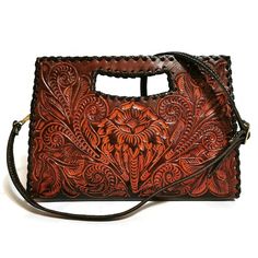 WOMEN'S  BAG  Featuring a gorgeous chiseled artisan design, this rustic  HAND TOOLED LEATHER Purse will help you bring a little VINTAGE flair to your everyday outfit. The perfect size for fitting all of your everyday essentials, this purse was actually handmade with love and care by talented artisans giving it a rustic touch that's hard to find in stores.  This purse comes CHISELED BOTH SIDES. The perfect choice as a GIFT FOR HER!! ( Birthday, Mothers day, etc.)  Measures: 🌹height: 20cm. 8  inc Daily Use Hand Tooled Satchel, Brown Hand Tooled Clutch Bag, Hand Tooled Top Handle Shoulder Bag, Hand Tooled Clutch Shoulder Bag For Daily Use, Artisan Engraved Shoulder Bag For Everyday, Hand Tooled Top Handle Bag, Engraved Satchel Bag For Everyday Use, Artisan Shoulder Bag With Engraving For Everyday Use, Artisan Shoulder Bag With Engraved Details For Everyday Use