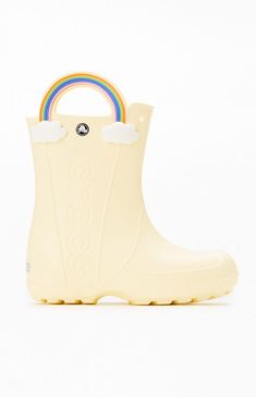 The Crocs Kids Handle It Rainbow Boots bring classic Crocs comfort to rainy days. With a waterproof build to keep feet cozy and dry, oversized handles for easy wear, and a fixed rainbow embellishment with squishy EVA clouds, these boots are perfect for fun and function in any weather.Fixed rainbow embellishment and squishy EVA cloudsWaterproof rain bootLarge handles for easy on and offReflective heel logosIncredibly lightweightIconic Crocs Comfort™ Crocs Kids Handle It Rainbow Boots - Ivory size 3 Kids White Waterproof Rain Boots For Spring, Casual White Rain Boots For Outdoor, Cute Waterproof Rain Boots For Outdoor, Cute Waterproof Outdoor Rain Boots, White Weatherproof Rain Boots For Outdoor, Rainbow Boots, Classic Crocs, 3 Kids, Rainy Days